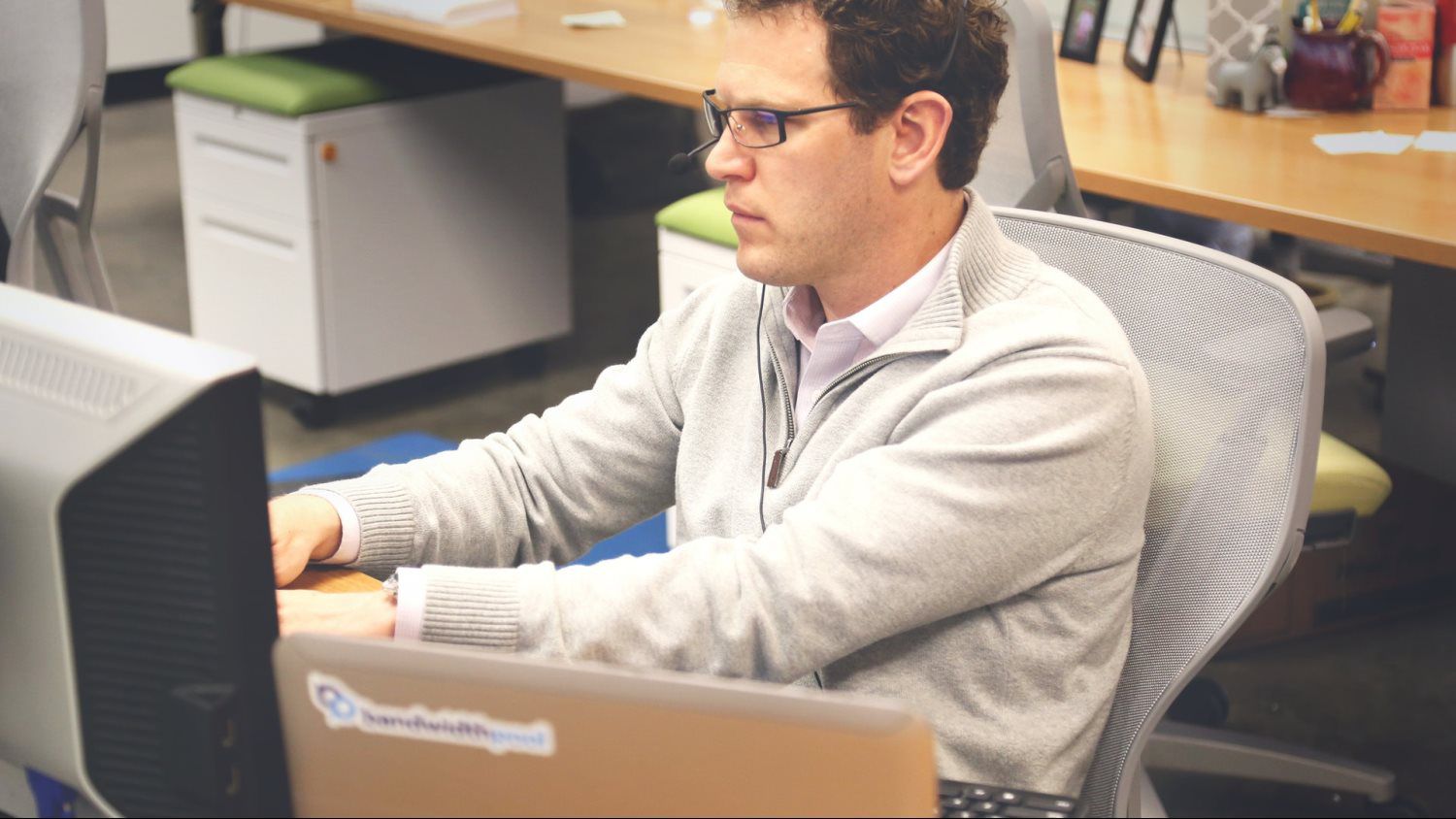 Man in front of a computer