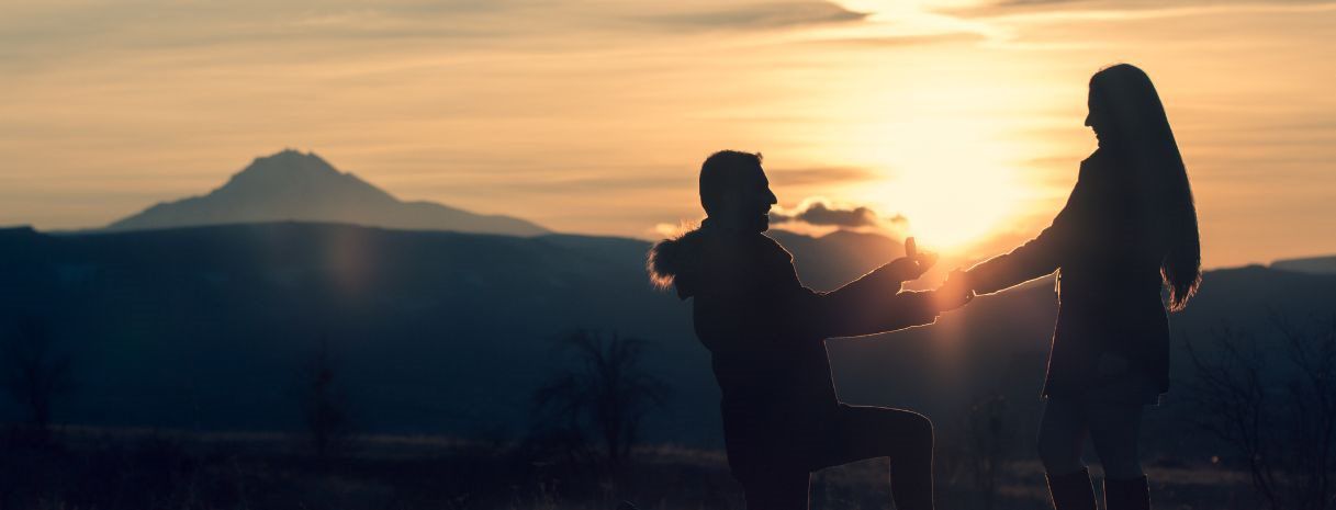 Romantic sunset marriage proposal silhouette – unique proposal idea inspiration for couples | Weddings by K’Mich