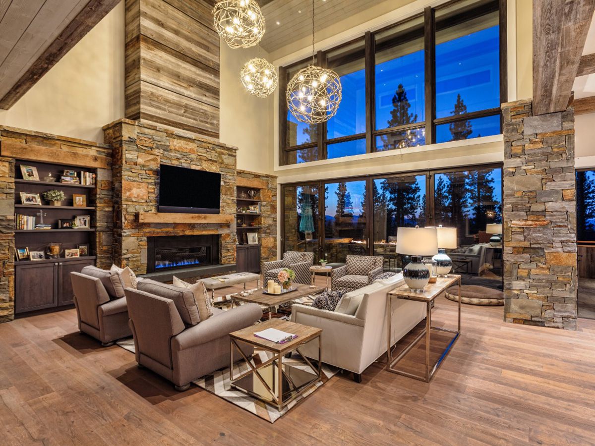 Bi-folding patio doors form Weather Shield blend in with transitional mountain home décor giving sleek look