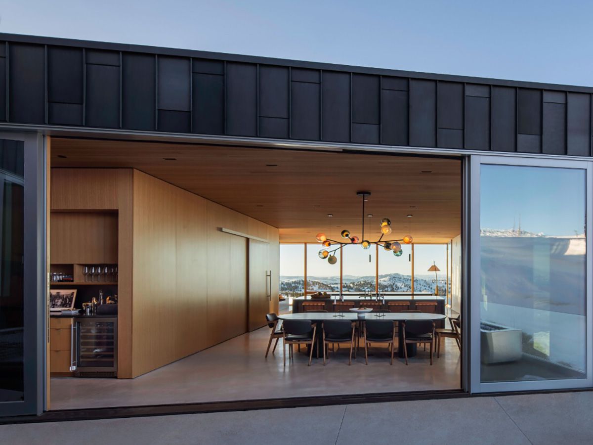 Multi-slide patio doors for wide openings on a mountain home by Marvin Ultimate collection