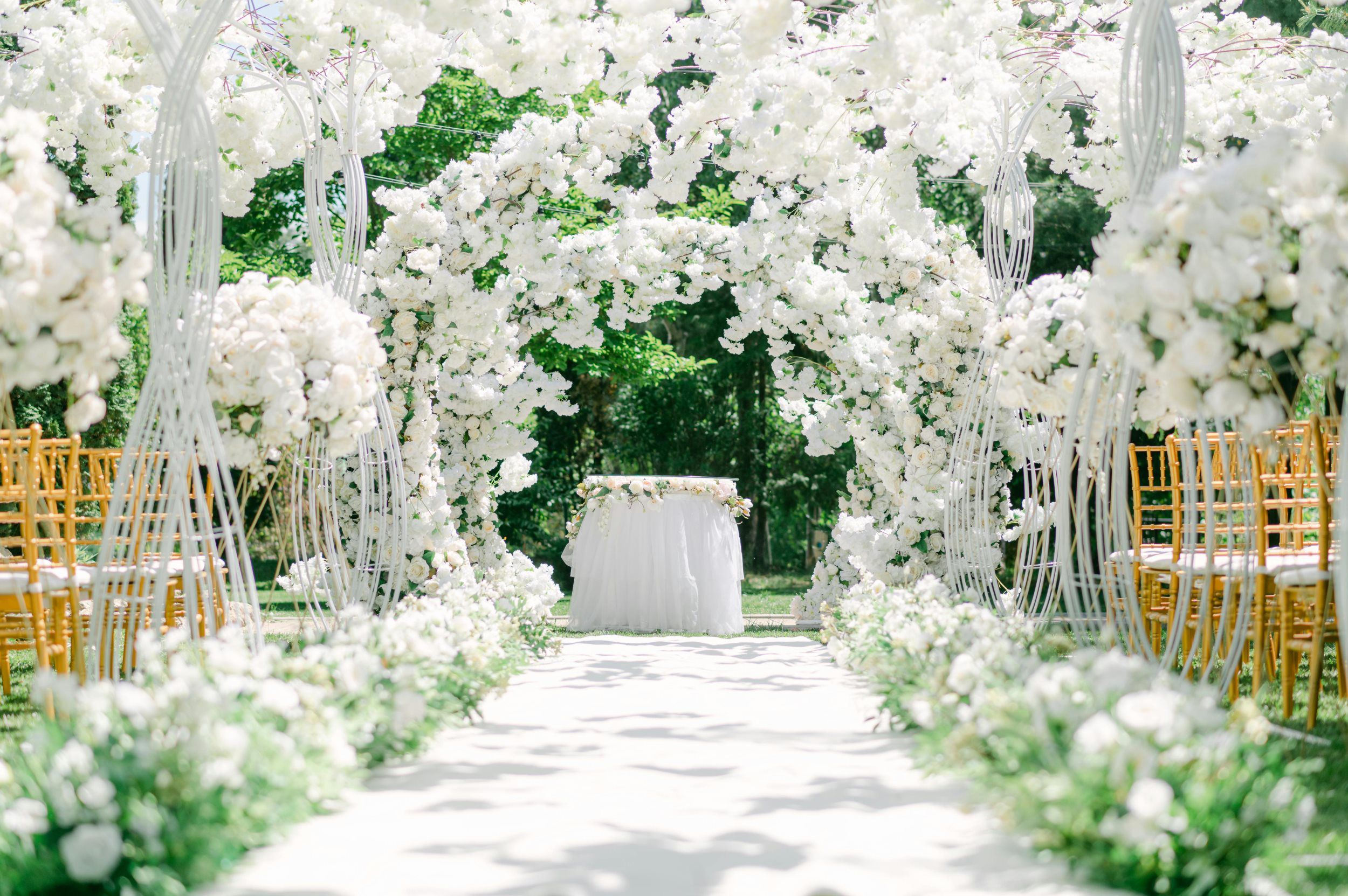 Outdoor ceremony seating with white accents and floral aisle décor — intimate wedding in Lafayette Hill by Weddings & Events by K’Mich