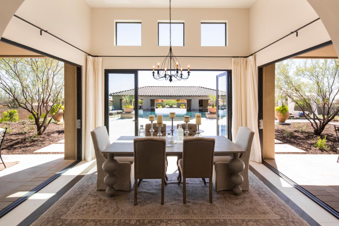 Milgard AX650 disappearing patio doors combine with multi sliding glass door panels and pocket configuration