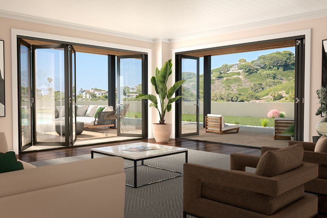 Milgard AX550 bifolding patio doors open to outdoor living area