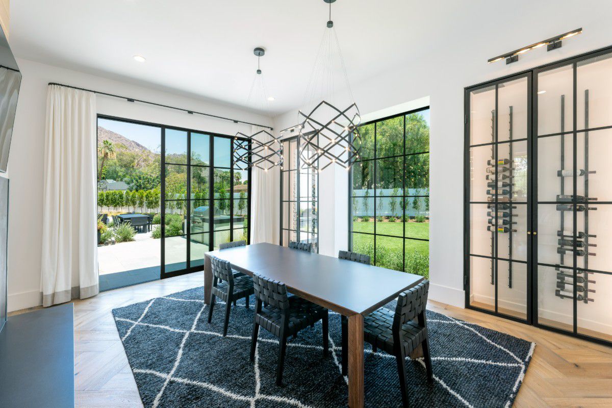 Western Architectural Openings multi-slide glass doors opening onto a patio