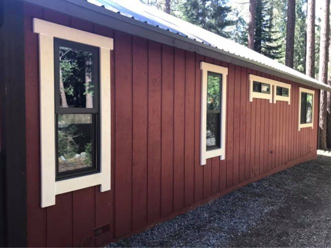 Replacement windows Rocklin, CA installed on modern cabin, enhancing energy efficiency, curb appeal, and natural light.
