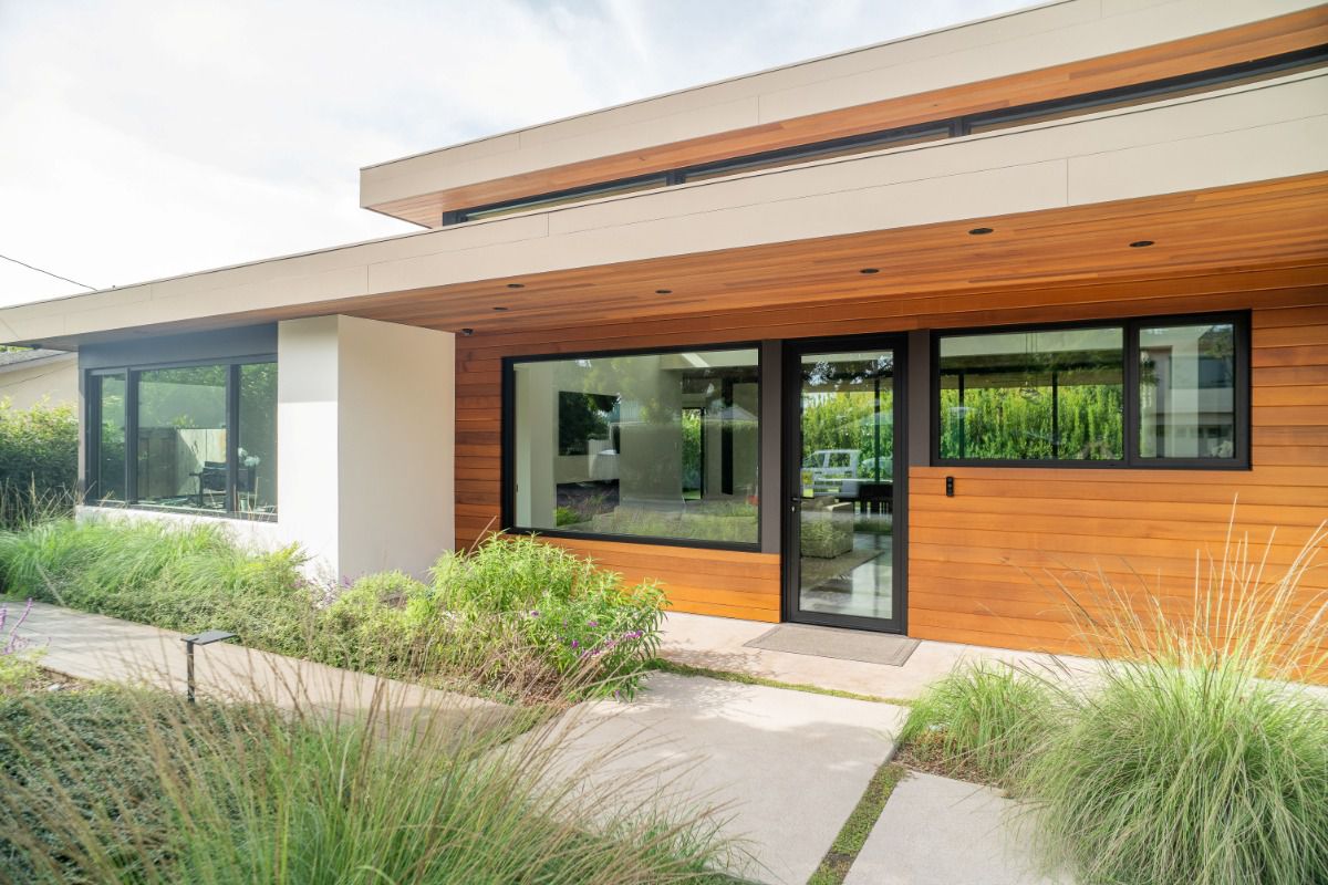 All Weather Series 6100 aluminum windows complement the clean lines of this modern custom home.