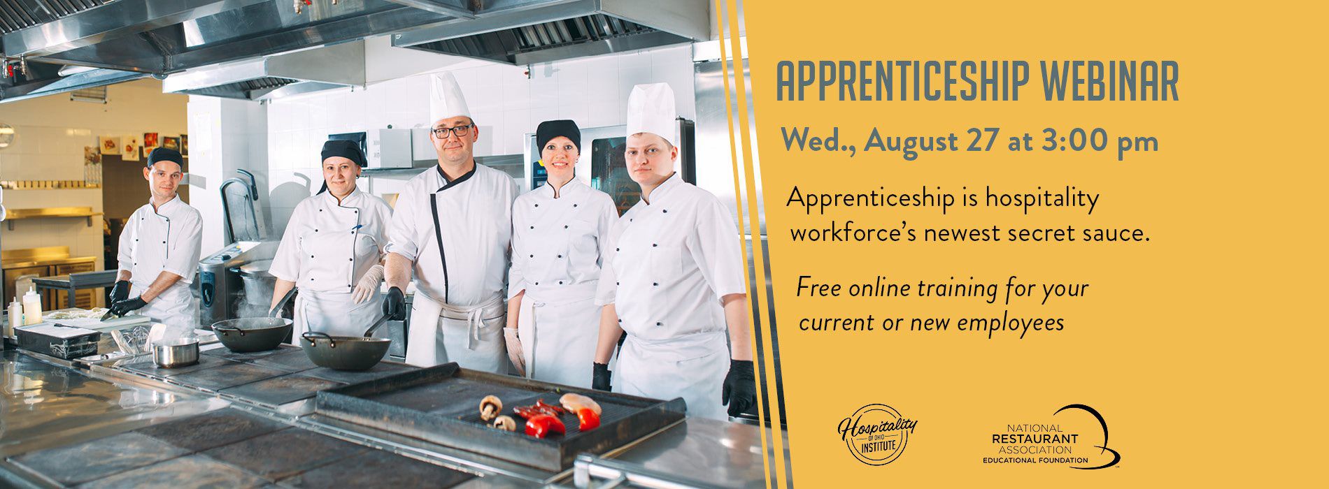Chefs in front of a stove.
