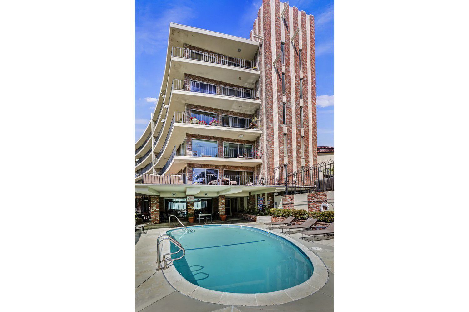 Building and swimming pool.