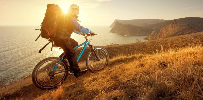 man climbing the mountain