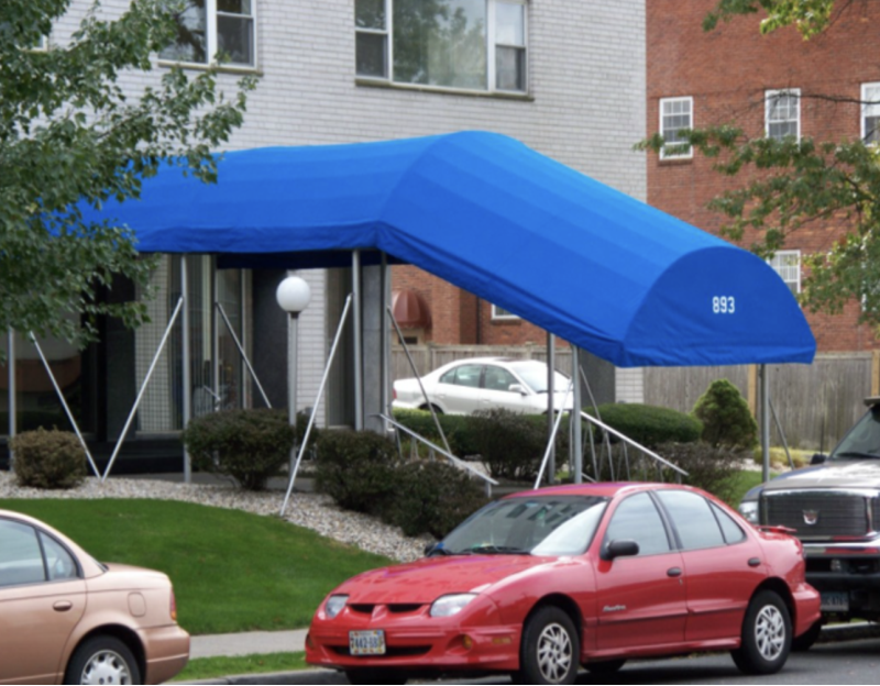 This vibrant blue canopy creates a covered entryway that welcomes guests while offering weather protection. Perfect for apartment buildings and event venues across NY and CT, our entry canopies are designed for elegance and practicality.