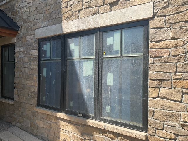 stone masonry with stone header and sill