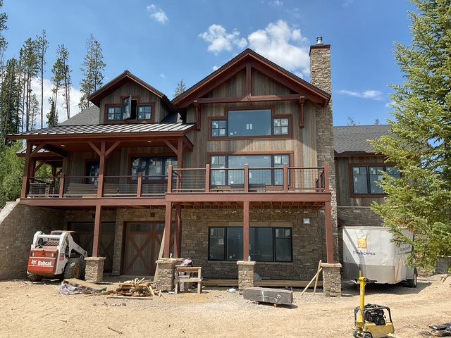 timber frame gables, covered porch, deck