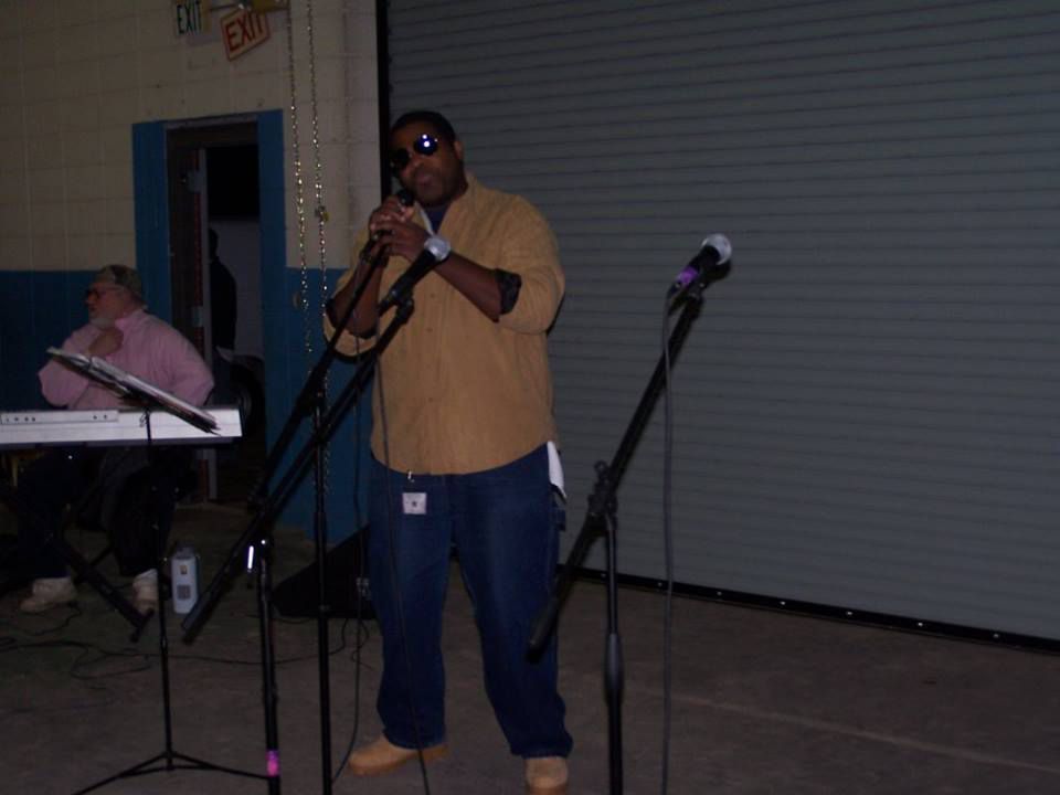 music artist holding a microphone