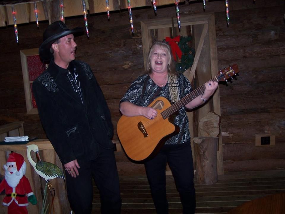 woman holding a guitar