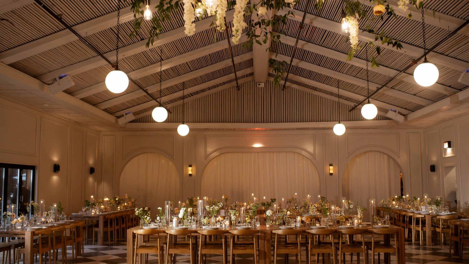 Wedding setting, table with candles and place settings.