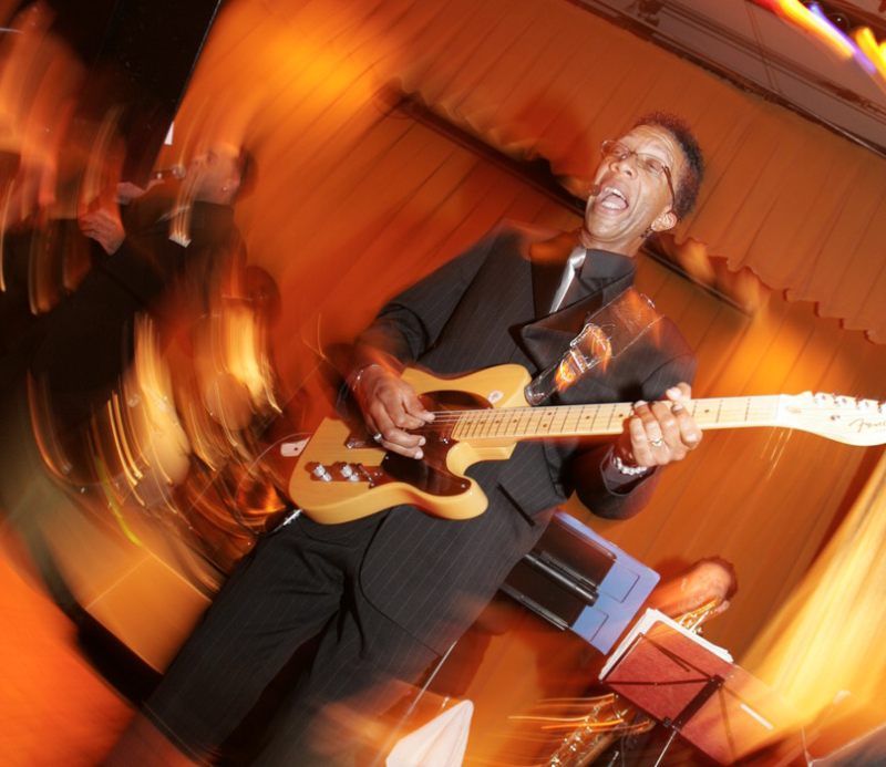 bryan lammers playing with his guitar