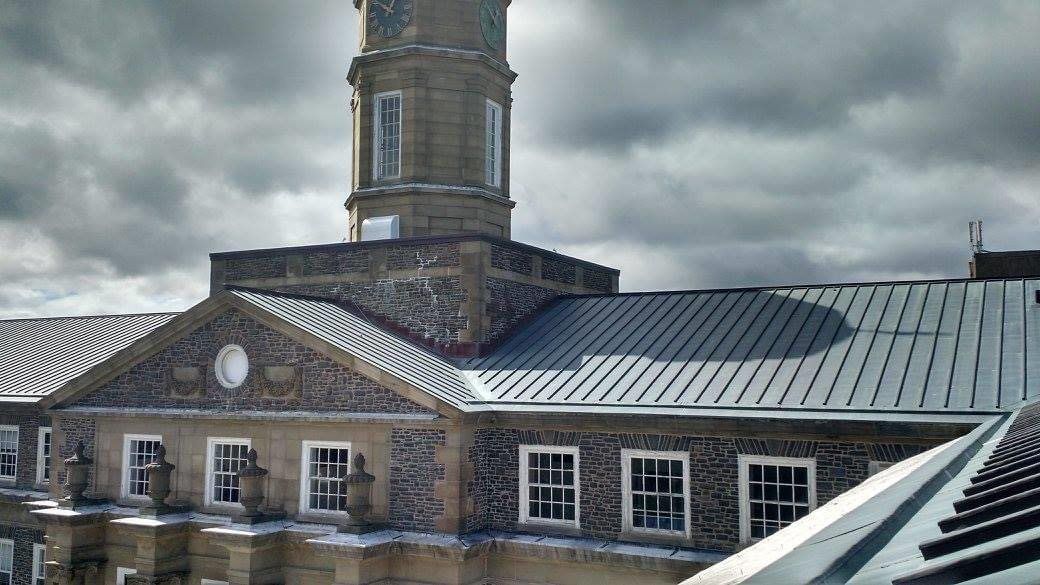 Large University roof with copper roof in Halifax NS