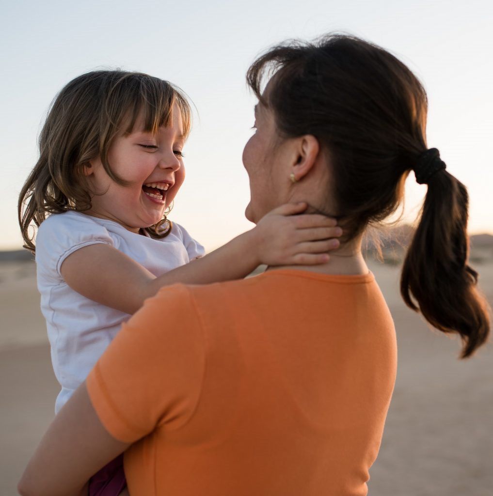 Smiling Mom With Daughter