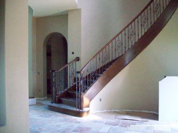 dark brown cable railing staircase