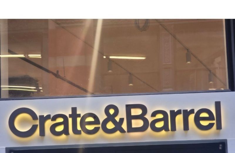 A modern reverse-lit channel letter sign with a sleek design, perfect for businesses aiming to enhance their brand in Mineola, New York. Produced by Awningstar, this sign works well with commercial shop front awnings, garden awnings for sale near me,