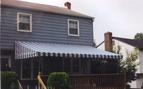 Residential awning by Mineola Signs and Awnings in Mineola, New York
A stylish residential awning installed by Mineola Signs and Awnings in Mineola, New York. This awning adds curb appeal and provides shade to the home's exterior. Wendell Awnings Nor