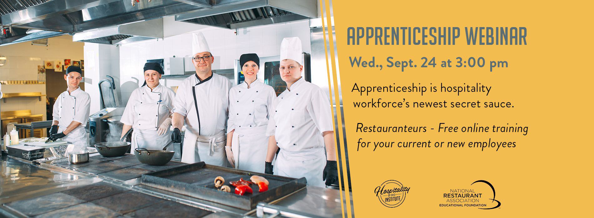 Chefs in front of a stove.