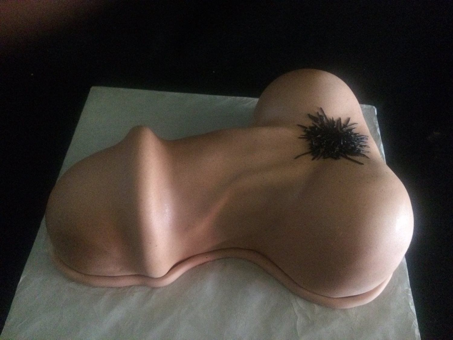 Molded white penis cake
