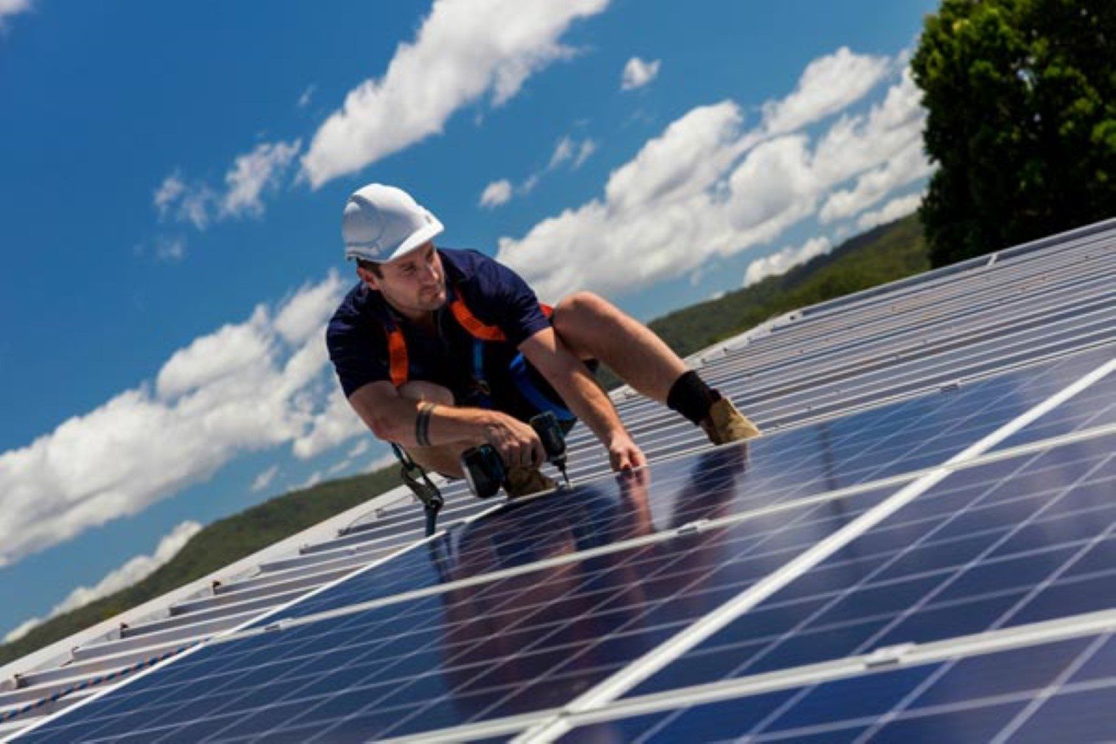 Halifax NS Solar Installation, man installing solar panels on rooftop