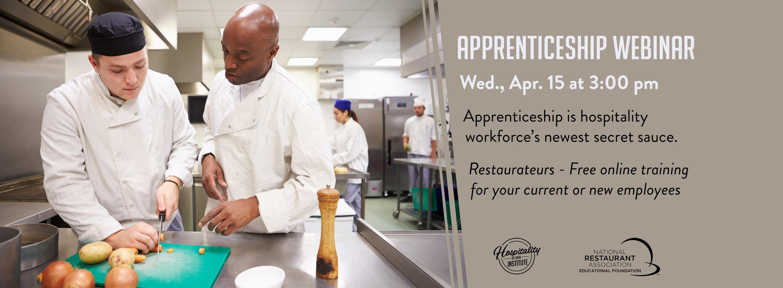 Chefs in front of a stove.