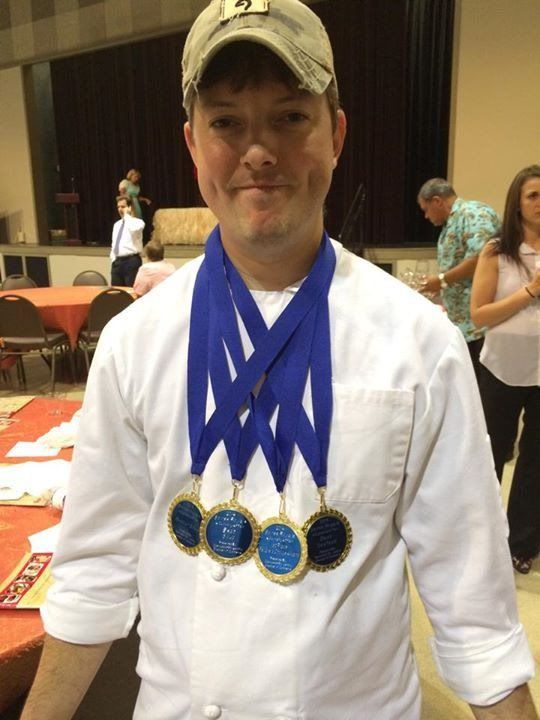 Jason Huguet with medals