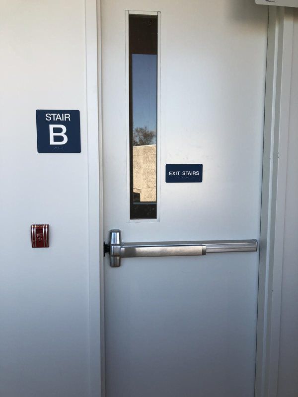 ADA room number sign, commercial outdoor awnings
A clear ADA room number sign designed for use in hotels or offices with commercial outdoor awnings. The sign features Braille and tactile characters for enhanced accessibility.