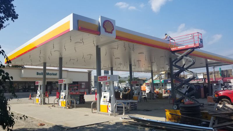 Professional sign installation services by Mineola Signs and Awnings in Mineola, New York, ensuring your storefront awnings, commercial canopies, and custom neon signs are securely installed. Our expert team near you guarantees a flawless finish for 