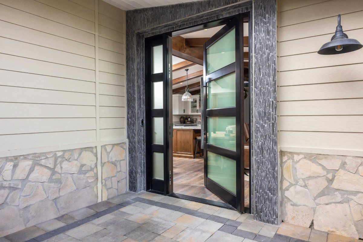 AG Millworks custom pivot entry door with contemporary architectural design